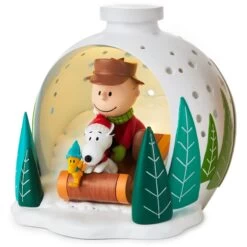 Hallmark Peanuts® Charlie Brown, Snoopy And Woodstock On Sled Light-Up Figurine, 4.6"